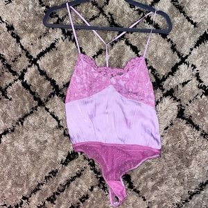NWOT Free people body suit.